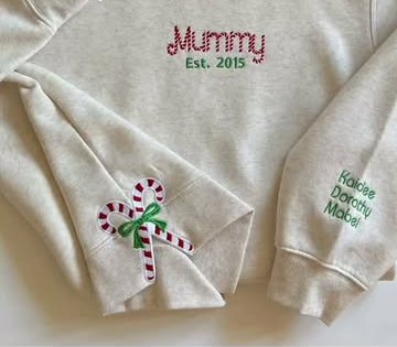 Oatmeal sweatshirt embroidered 'Mummy Est. 2015' with names on the sleeve